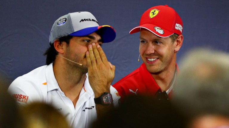 Carlos Sainz and Sebastian Vettel