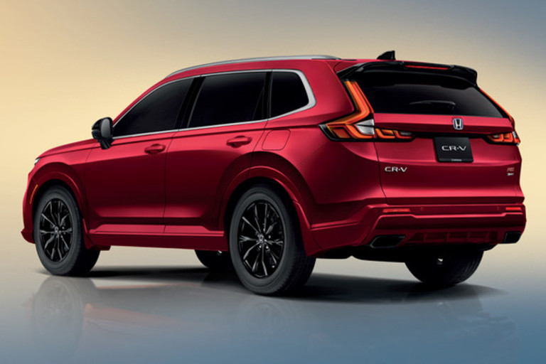 Rear quarter view of red Honda CR-V e:HEV RS